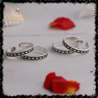 925 silver adjustable toe rings with silver "X" sllver and black oxidised back ground